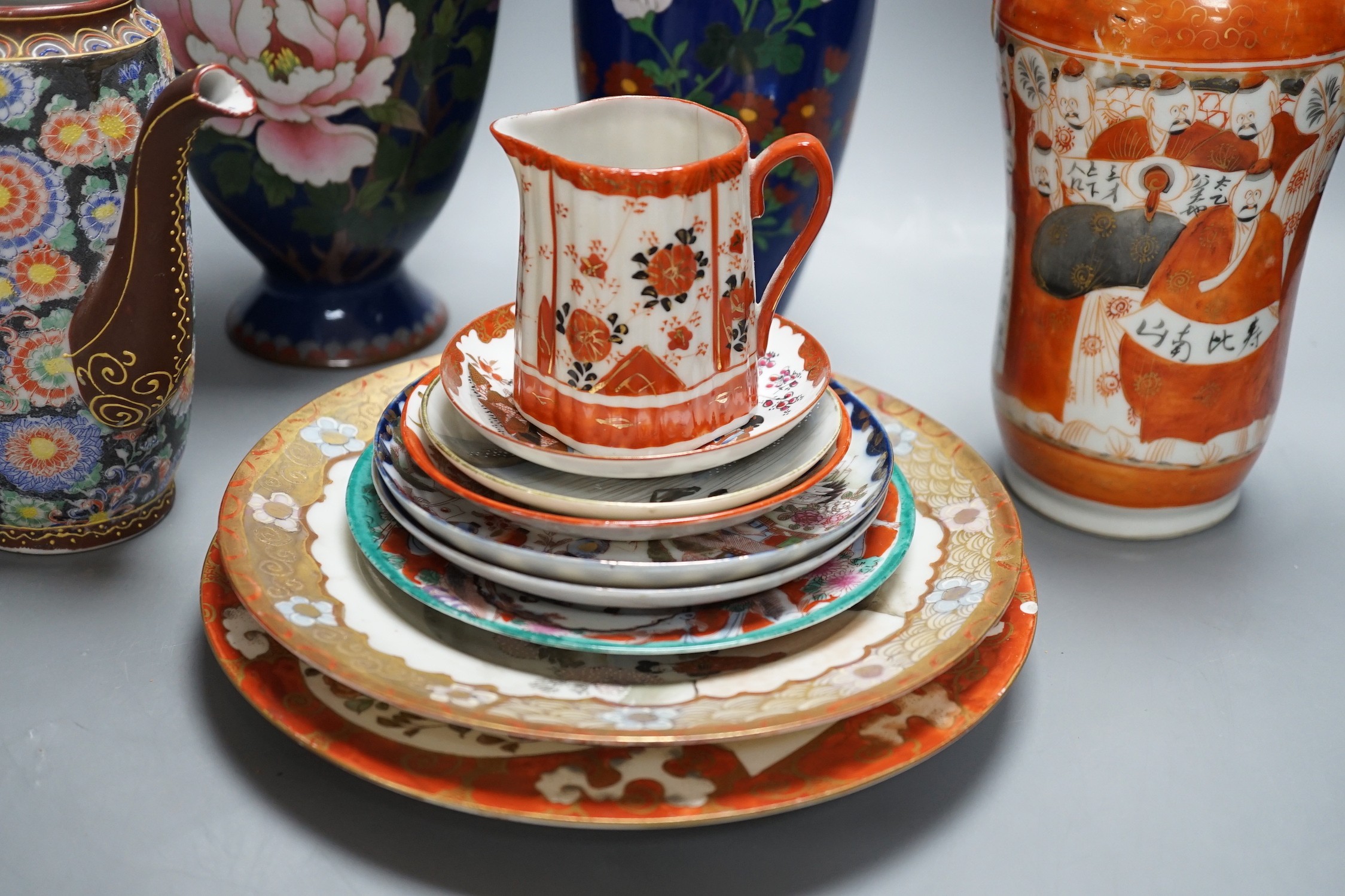 A mixed group of Japanese cloisonné enamel vases and porcelain vases and plates
